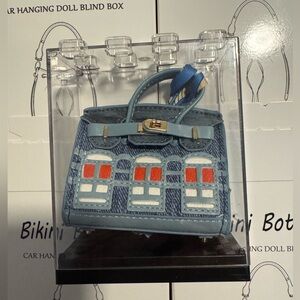 Blue Denim Handbag with Red Accents